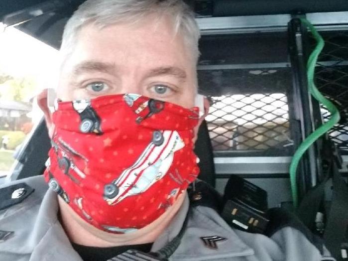 NHP trooper John Dodge wearing one of Cathy Barbie's hand crafted face masks.