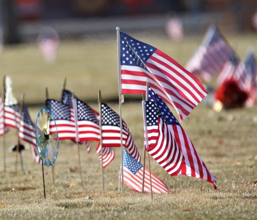 Photo by Brett Fisher. Flags placed on graves at Lone Mountain Cemetery in Carson City.