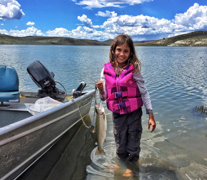 Tarrah Newell with her catch last fall at Wall Canyon Reservoir. Saturday is Nevada's annual Free Fishing Day.