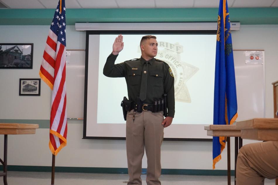 Jacob Vanbeuge takes his vows as a Sheriff's Deputy