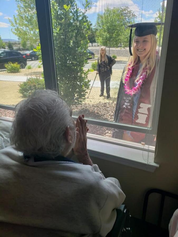 High school graduates stop by for a window visit and grandparents beam with pride.