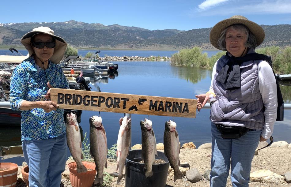 Marge Tanaka and Carol Ng with rainbow trout from Bridgeport reservoir, 2019.