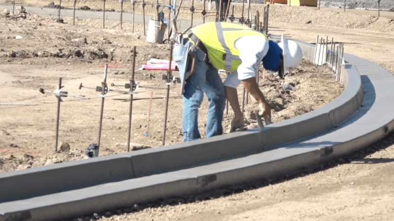 Work continues on the roundabout curb and gutter