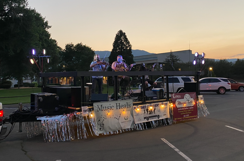 Spike McGuire and Six Mile Station play Mills Park for the Flatbed Concert Series