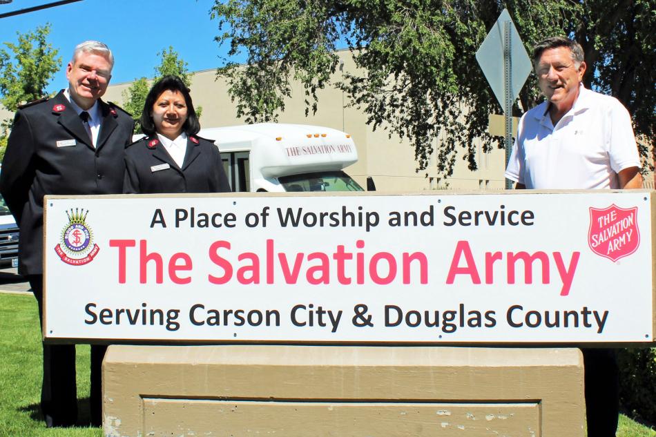 Salvation Army Captains Dora and Mark Stearns with advisory board chair P.K. O’Neill. 