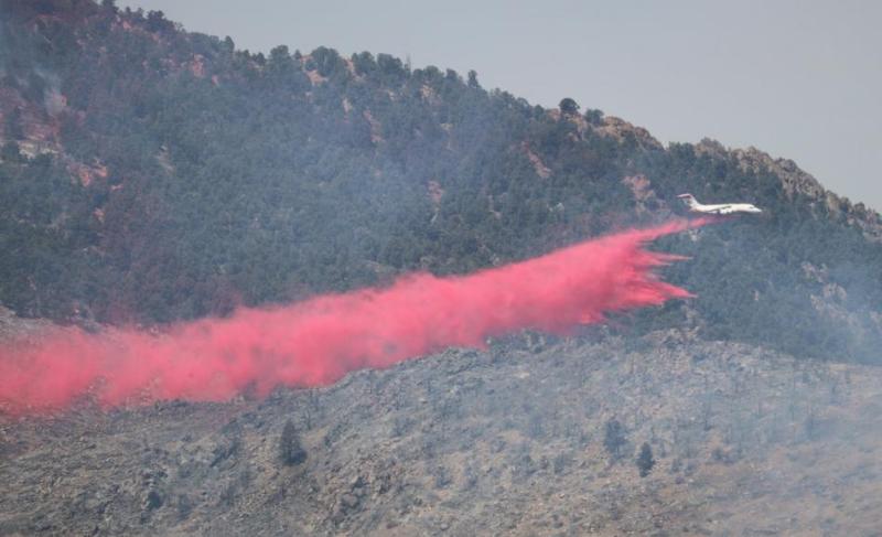 Aircraft continue to make drops on the Slink Fire south of Topaz near Coleville. Photo: U.S. Forest Service