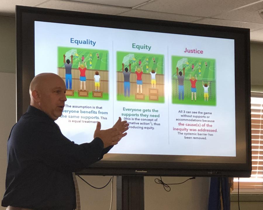 Workman delivers presentation at student focus group meeting during 2019-20 school year.