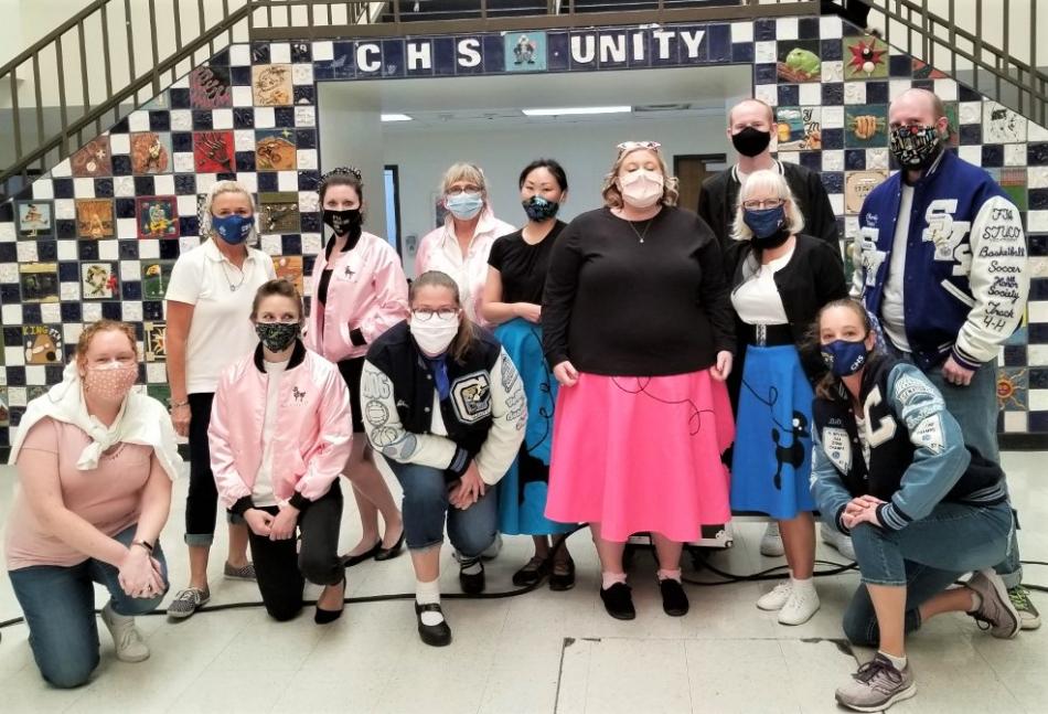 CHS teachers pose for a shot while wearing their 50s themed outfits during Retro-Homecoming and Week of Respect.