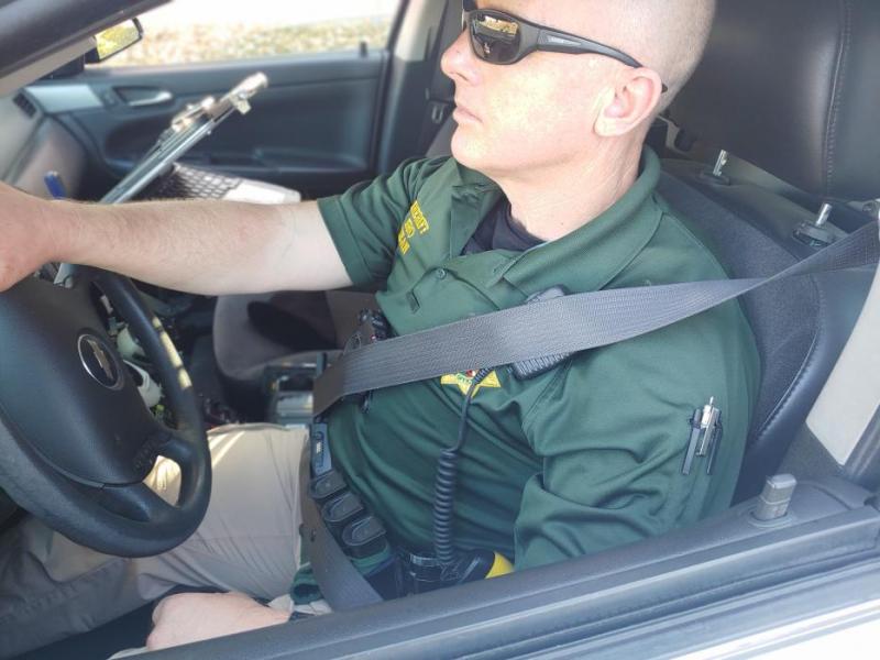 Carson City SRO Dan Williams buckles up.