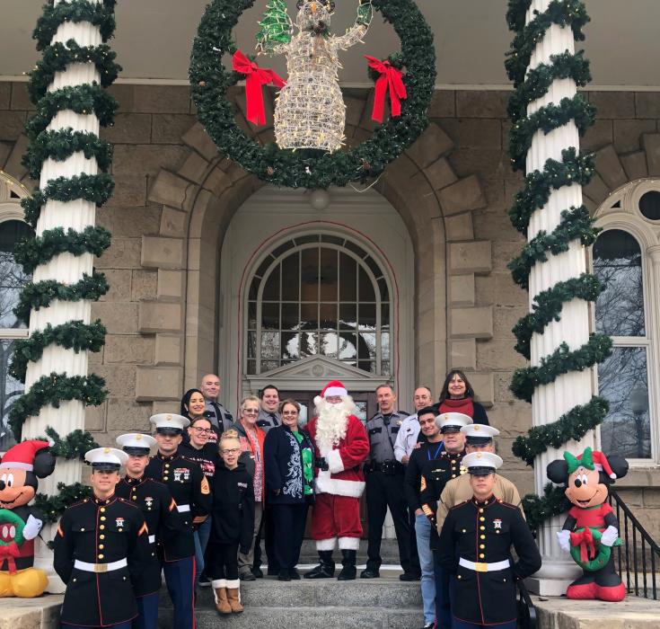 Santa and his elves pick up toys from the Toys for Tots drive 2019