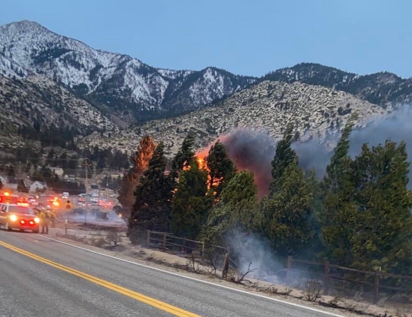 A wildfire whipped through the Foothill area in Douglas, voluntary evacuations are underway.