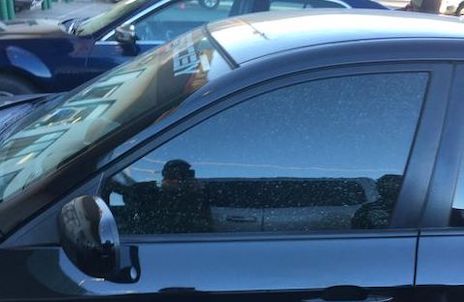 This vehicle also had its window glass shattered. There are at least 20 instances of vandalism around town.