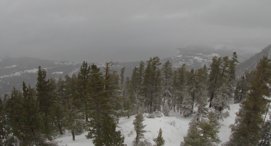 Snow showers arrive Sunday morning at Heavenly. Photo by alertwildfire.org