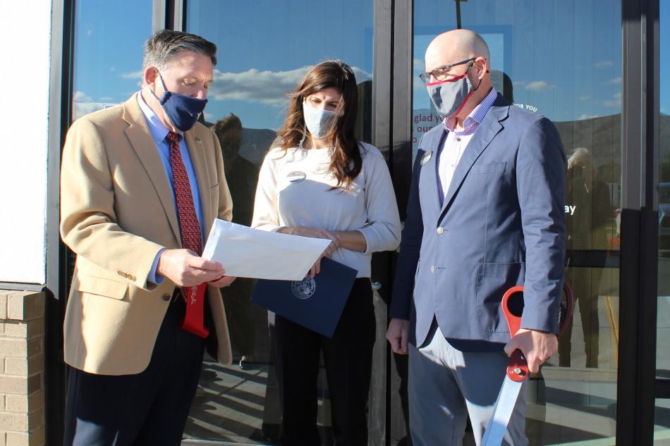Carson City AD 40 Assemblyman PK O’Neill presents owners Kelly and Matt Hock with a congratulations certificate.