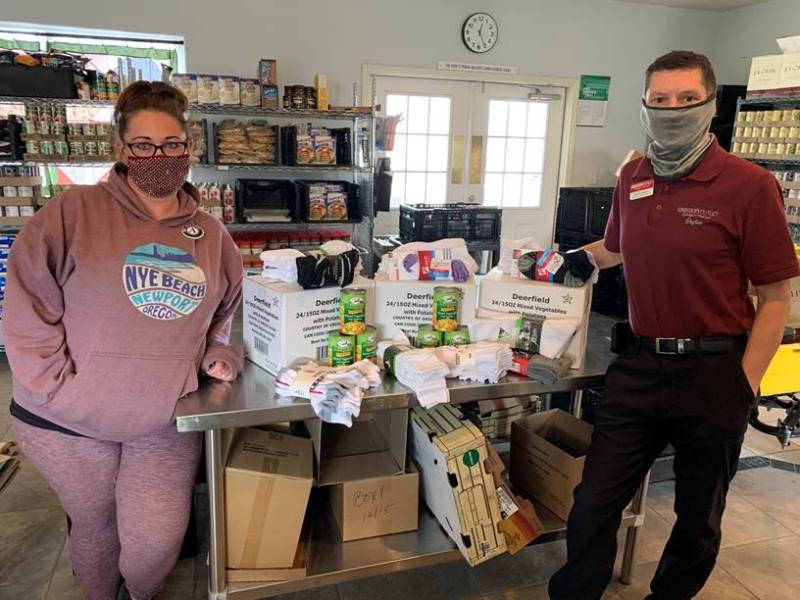 Daniel Knight of the Dayton Grocery Outlet and Jolien Turner of HCC