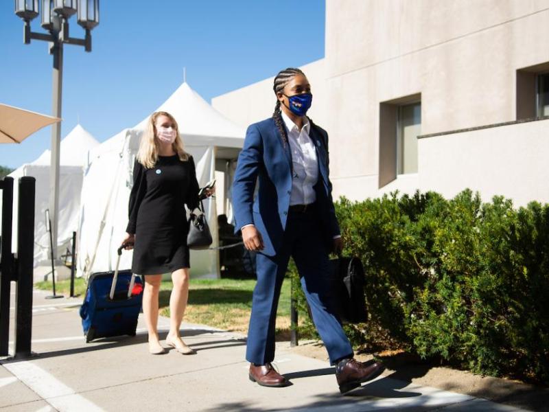 State Senators Dallas Harris, right, and Melanie Scheible arrive at the Legislature on Friday, July 31, 2020