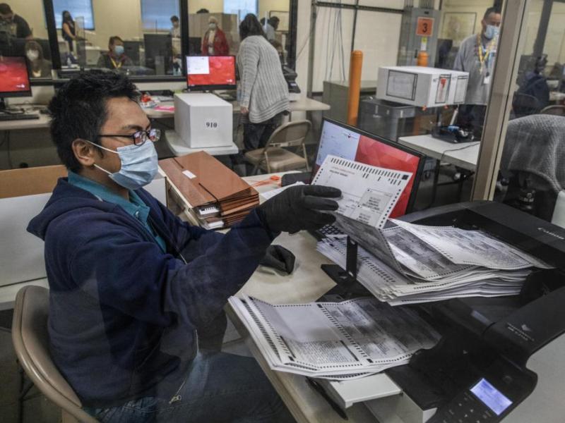 Clark County Election Department personnel process mail in ballots on Friday, Oct. 30, 2020. Jeff Scheid/The Nevada Independent