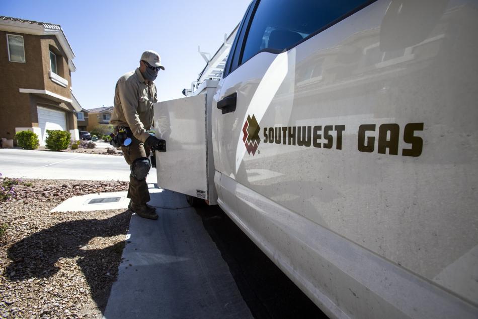 A Southwest Gas technician makes a service call in Las Vegas on Friday, April 16, 2021. (Jeff Scheid/The Nevada Independent)