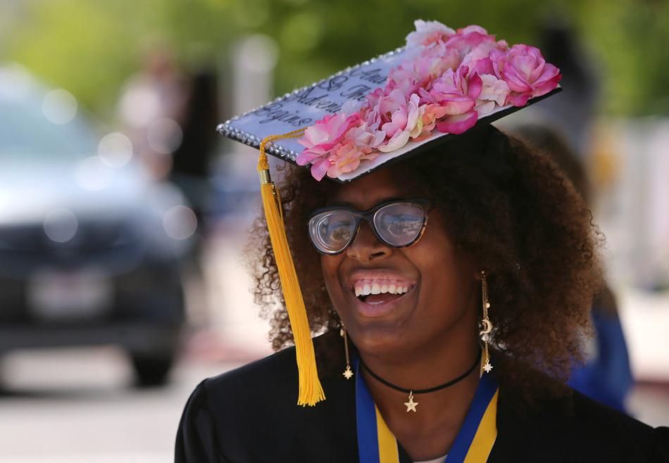 Tania Rose of Las Vegas is overjoyed as she graduates from WNC with an Associate of Arts degree.