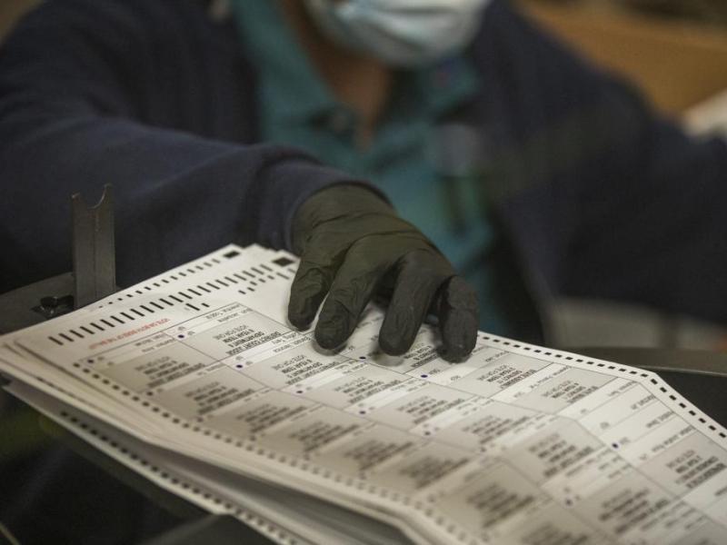 Clark County Election Department personnel process mail in ballots on Friday, Oct. 30, 2020. Jeff Scheid/The Nevada Independent