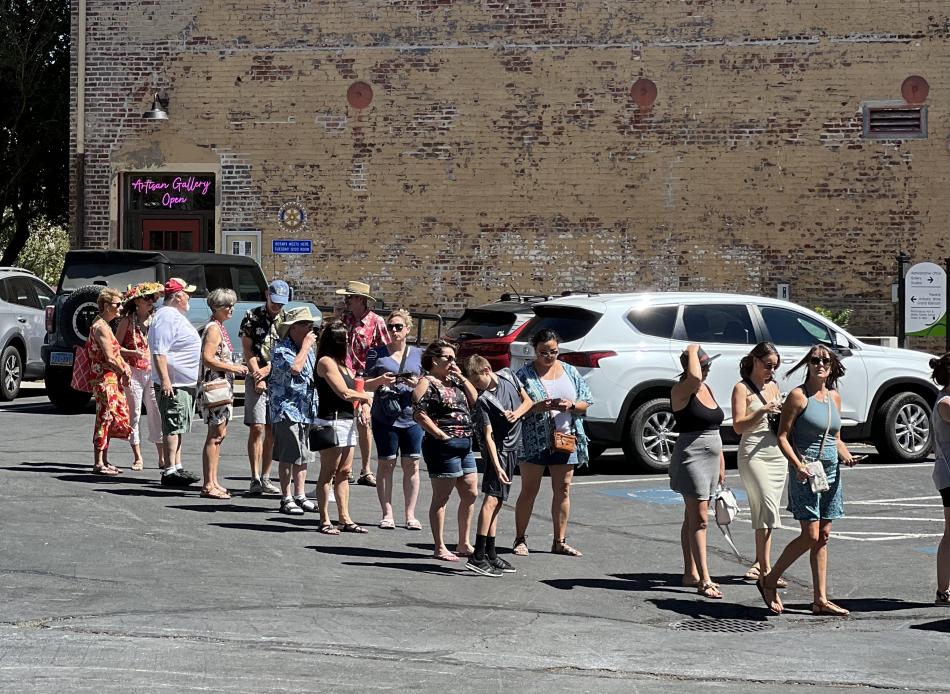 Participants in the September Carson City Wine Walk start to gather in the line at 1 p.m.