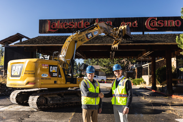 Mike Bradford and Dr. Clint Purvance in front of Lakeside Inn Monday. Photo provided.