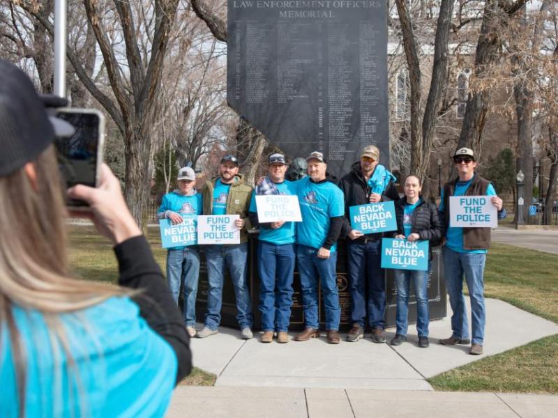 Supporters in front of the Nevada Law Enforcement Memorial March 8, 2022. (David Calvert/The Nevada Independent)