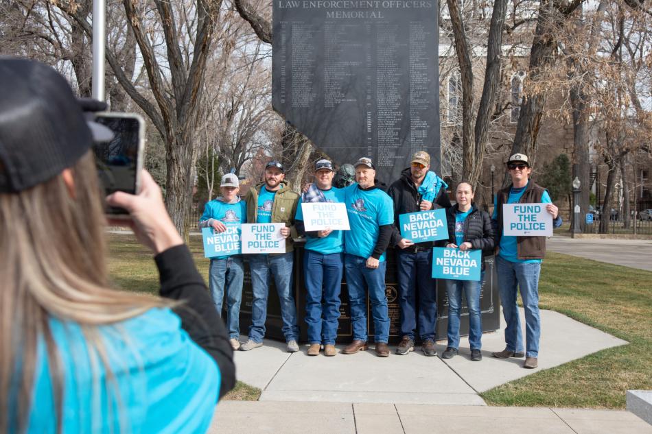 Supporters in front of the Nevada Law Enforcement Memorial March 8, 2022. (David Calvert/The Nevada Independent)