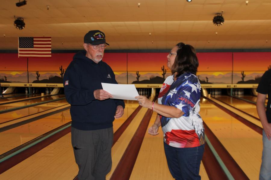 Local BVL Committee Chair Sandra Hibler presents a check for $5,970 to Munk Mann, Veteran's Guest House in Reno.