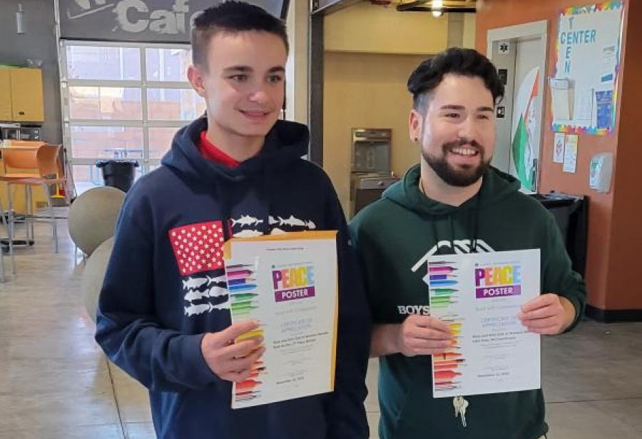 Peace Poster Contest 2nd place winner Ryan Archer with Boys and Girls Club Art Director John Soto