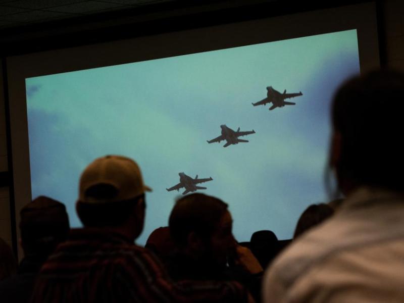 A video presentation by the Navy plays during a public meeting. (David Calvert/The Nevada Independent)