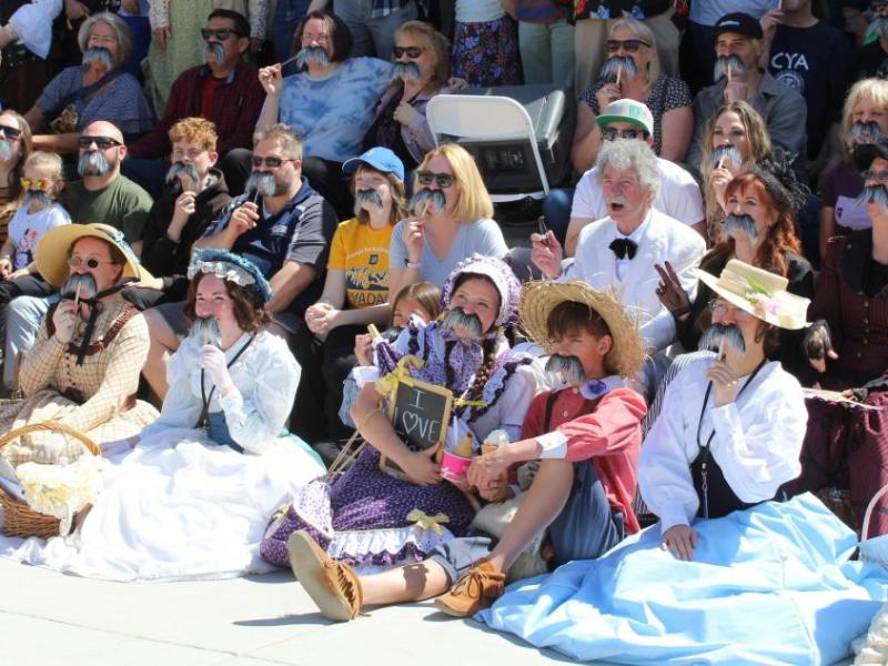 Everyone looks great in a Mark Twain mustache! Photo via Carson City Chamber of Commerce.