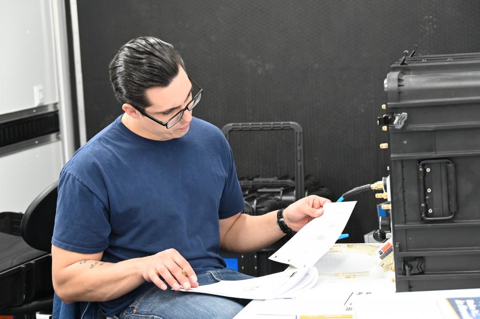 Offender Cameron Castaneda goes over material in the courses offered by Western Nevada College at Stewart Conservation Camp.