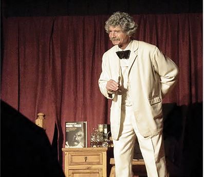 McAvoy Lane as Mark Twain.