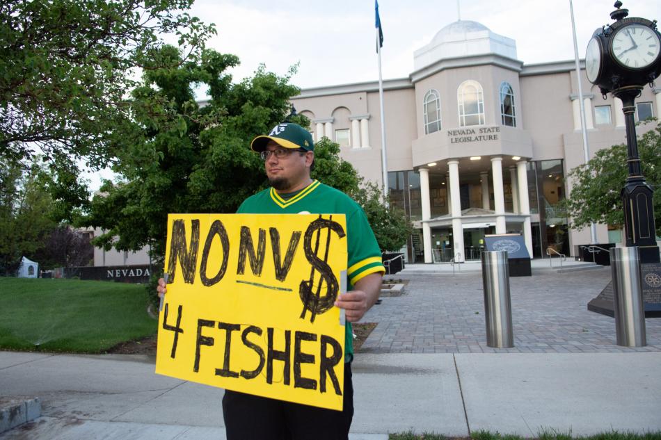roy Stansbury, an Oakland A’s fan from Carson City stands outside the Legislature. (David Calvert/The Nevada Independent)