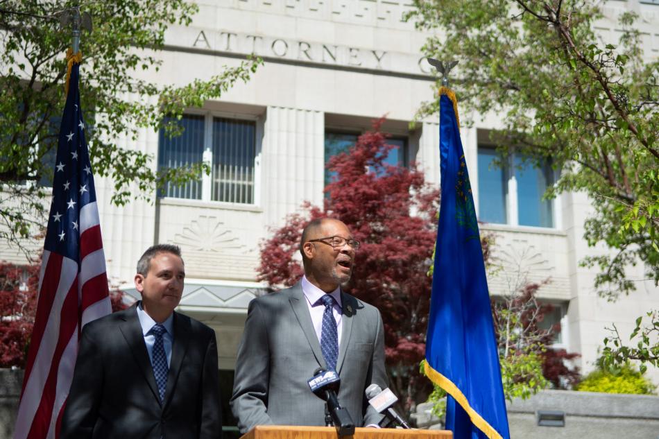 Attorney General Aaron Ford and Chief Deputy Attorney General Mark Kreuger during a press conference in May.