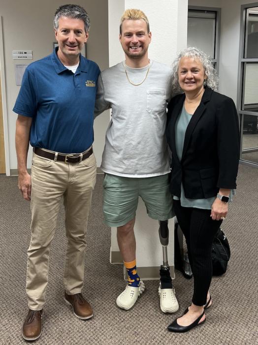 WNC President Dr. J. Kyle Dalpe, left, and WNC Disability and Support Services Director Susan Trist, right, pose with Gowen.