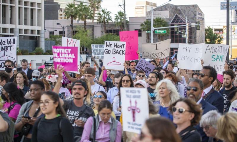 A crowd gathers at a  reproductive health rights demonstration in May 2022 in Las Vegas. (Daniel Clark/The Nevada Independent)