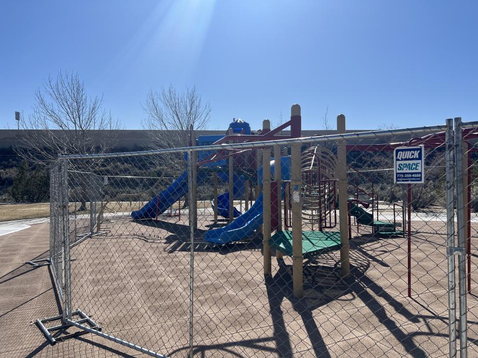 The fenced off playground that is under construction at the park.