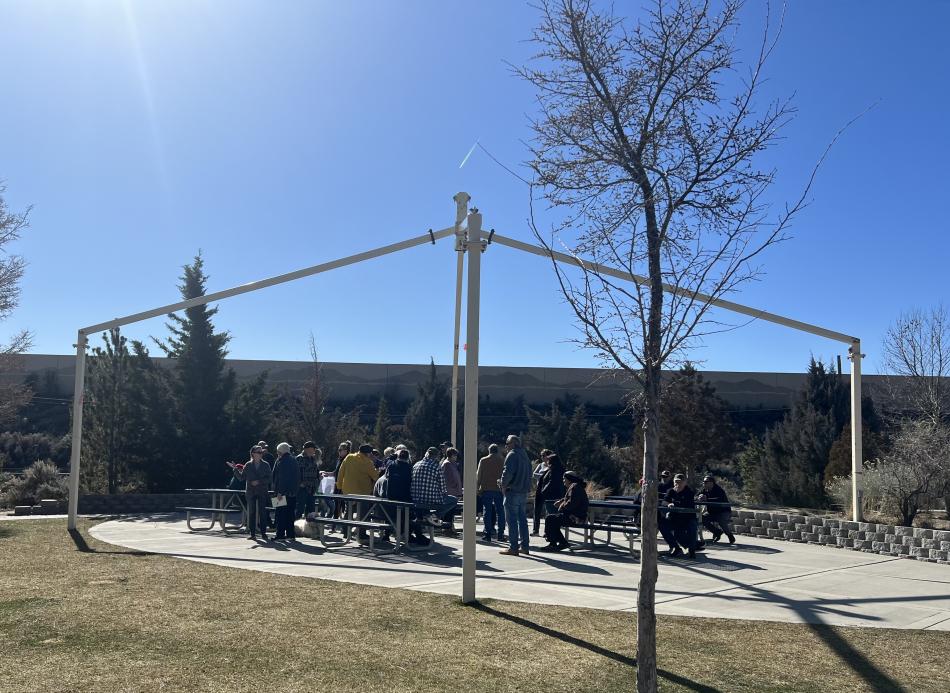 Residents gather for meeting about dog park controversy.