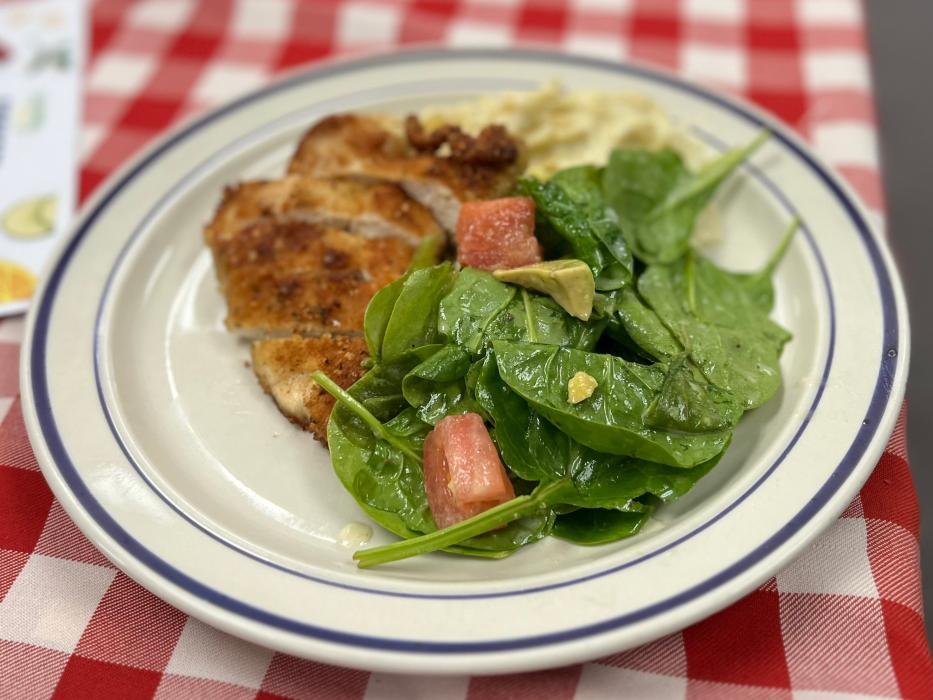Garlic chicken with alfredo and spinach salad.