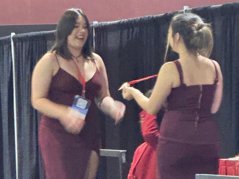 Aiko Ruelan receives a medal.