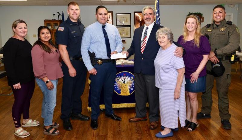 (L-R) Holiday with a Hero team members, co-founder Meliah Gonzales, board member Kim Serrano, Carson City Fire Capt. Matt Cooper
