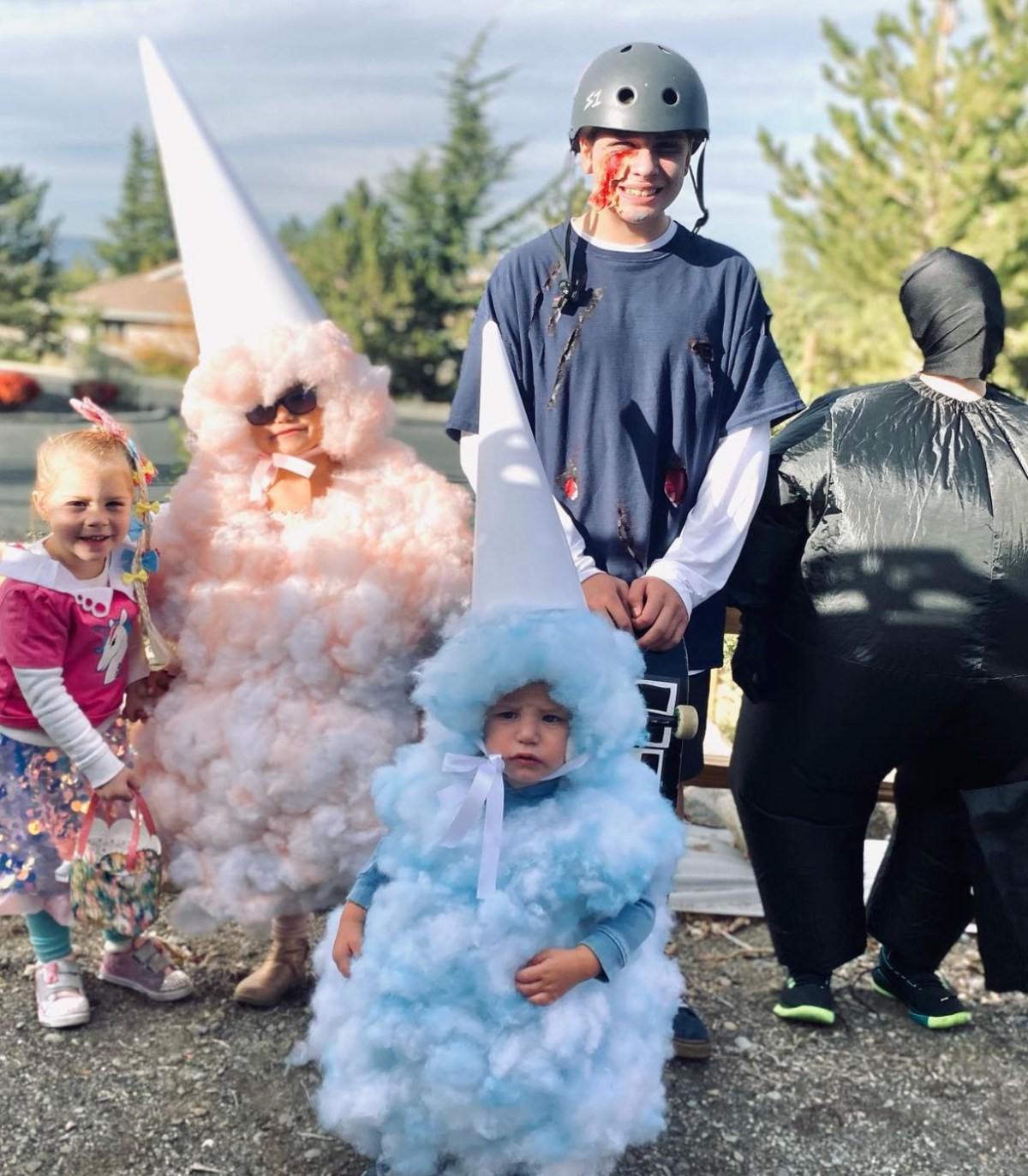 A group of children pose for a Halloween photo