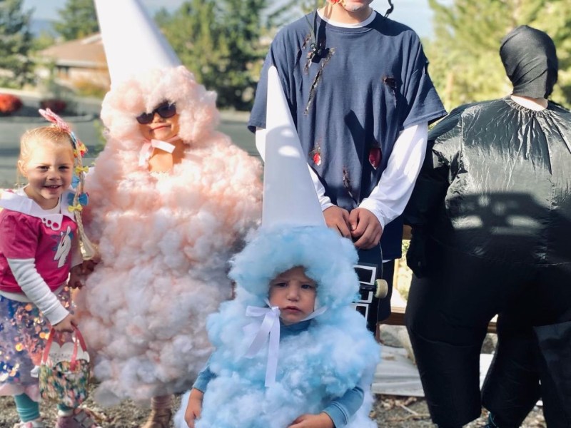 A group of children pose for a Halloween photo