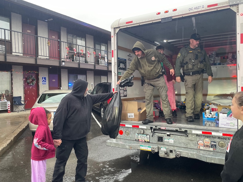 Carson City Sheriff’s Office deputies deliver Christmas gifts to children living in local motels
