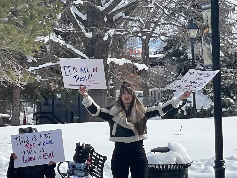 Demonstrators hold Save the Children protest in front of capitol in Carson City