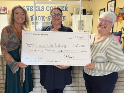 Volunteers turn used books into $75,000 check to Carson City Library
